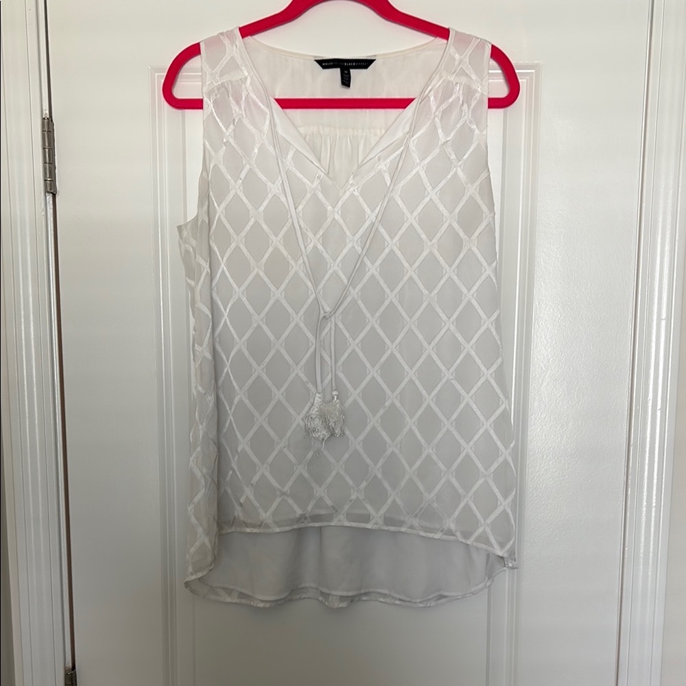 White Sleeveless Blouse